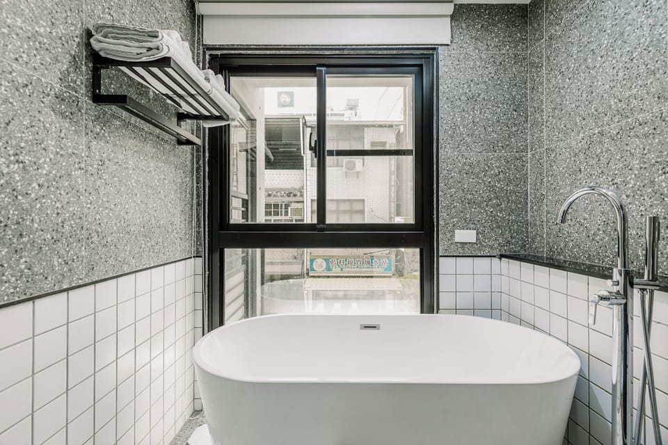 Superior Quadruple Room, Bathtub | Bathroom | Free toiletries, hair dryer, slippers, towels