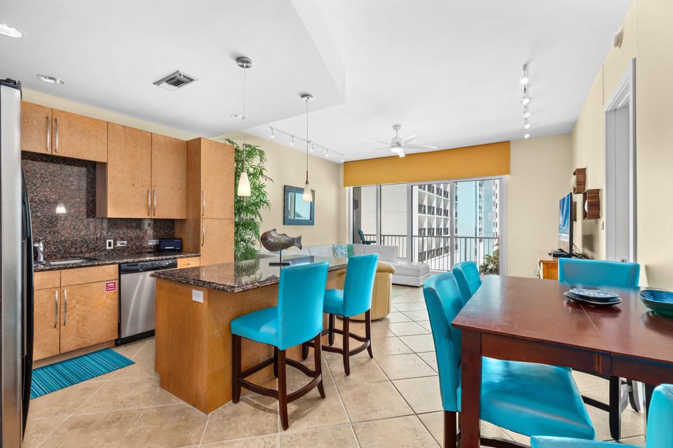 Fantastic open living, kitchen, and dining concept. Guests will love the extra seating at the kitchen bar