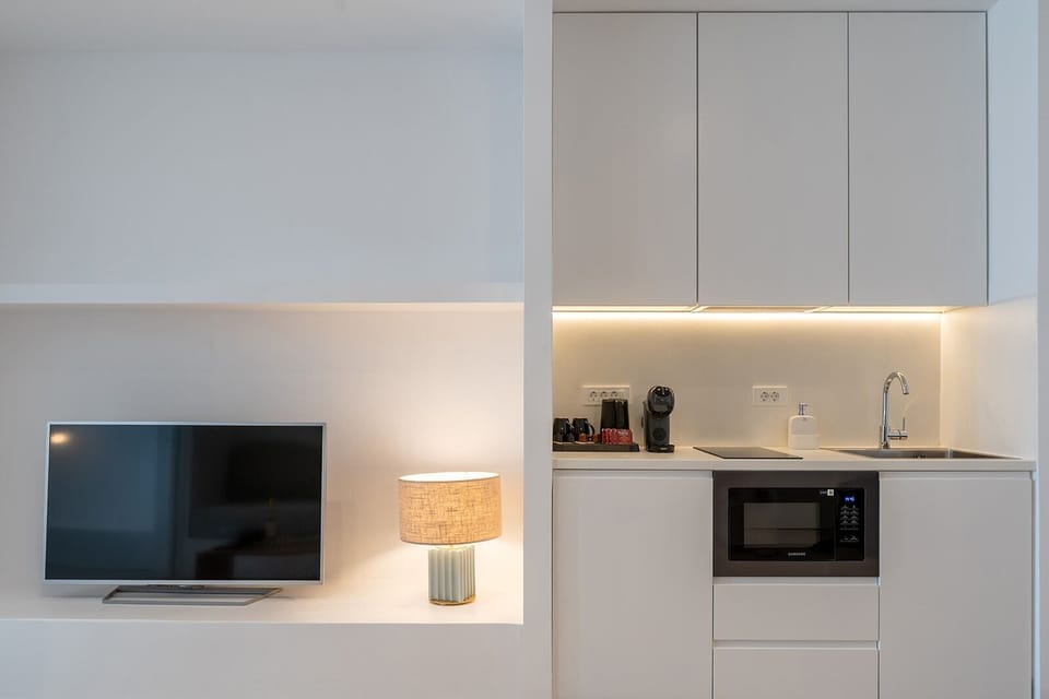 Deluxe Apartment, Hot Tub, Sea View | Private kitchen | Mini-fridge, microwave, espresso maker, coffee/tea maker