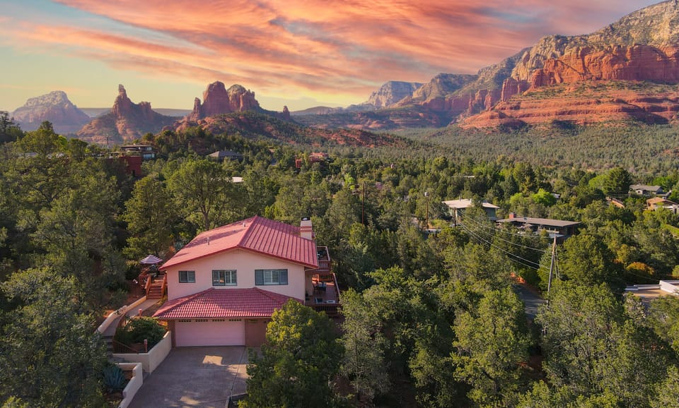 Bird's eye view at sunset w/light on the red rocks. Incredible views!
