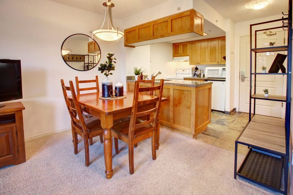 Cook or enjoy a take out meal after a long day on this beautiful wood dining set that seats 4 `Loved the provision of basics such as good quality olive oil, salt pepper, tea bags etc. We even found a coffee maker and filter papers.`-Joy, UK