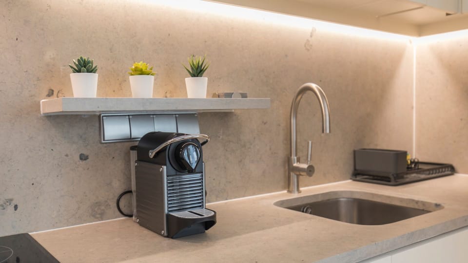 A coffee machine is available in the kitchen!