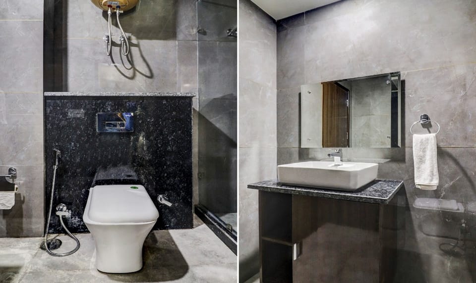 Shower, rainfall showerhead, slippers, towels