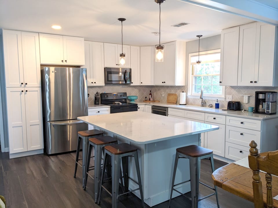 New kitchen with large island and all cooking essentials available