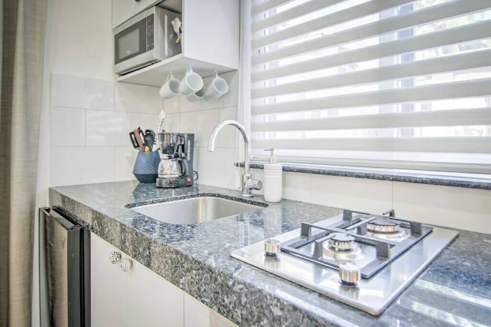 Fully equipped kitchen with drinking water provided for all guests