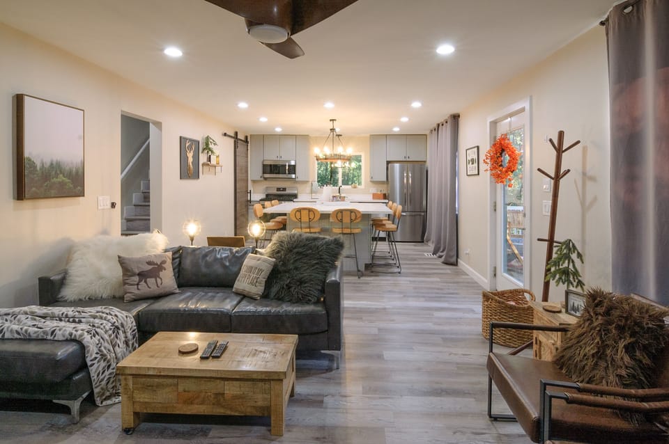 Large open floorplan extends across the front of the cabin