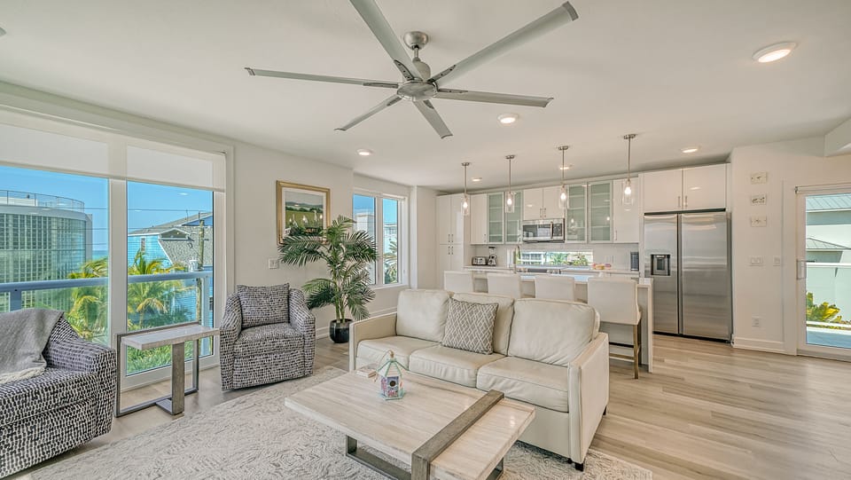 Living room and kitchen thoughtfully laid out for comfort and convenience.