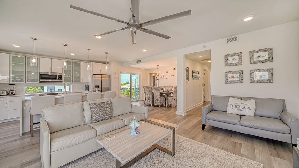 Living room and kitchen thoughtfully laid out for comfort and convenience.