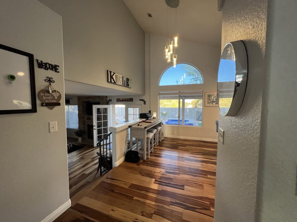 From Dining room to kitchen (pool view).  It is so light and airy feeling