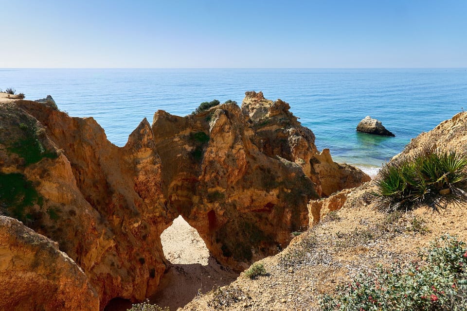 Rock arch on the beach in Alvor