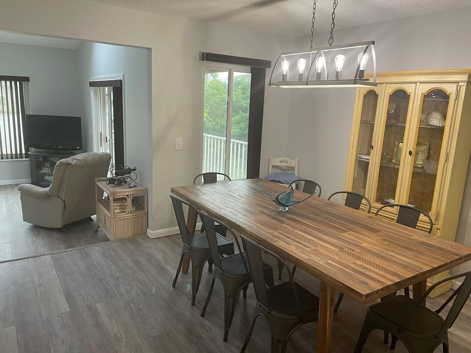 Dining Room- large table that comfortably seats 8 adults. High chair available