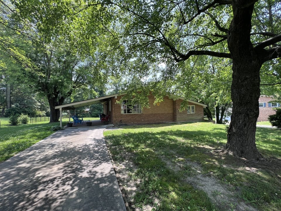 Welcome to our home - shaded with lots of big, old trees!