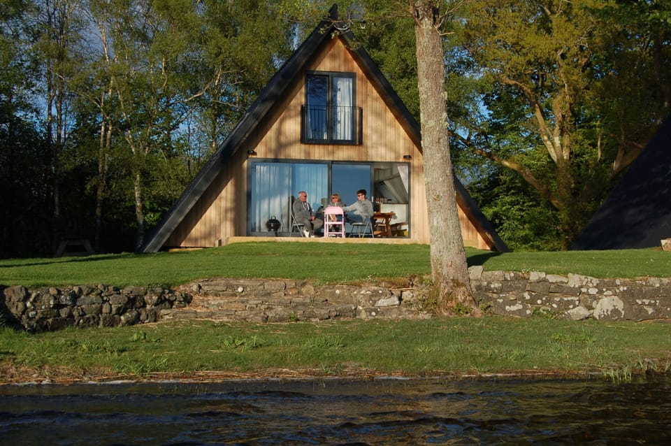 Exterior of 'Heron' Luxury A Frame Chalet from the lake