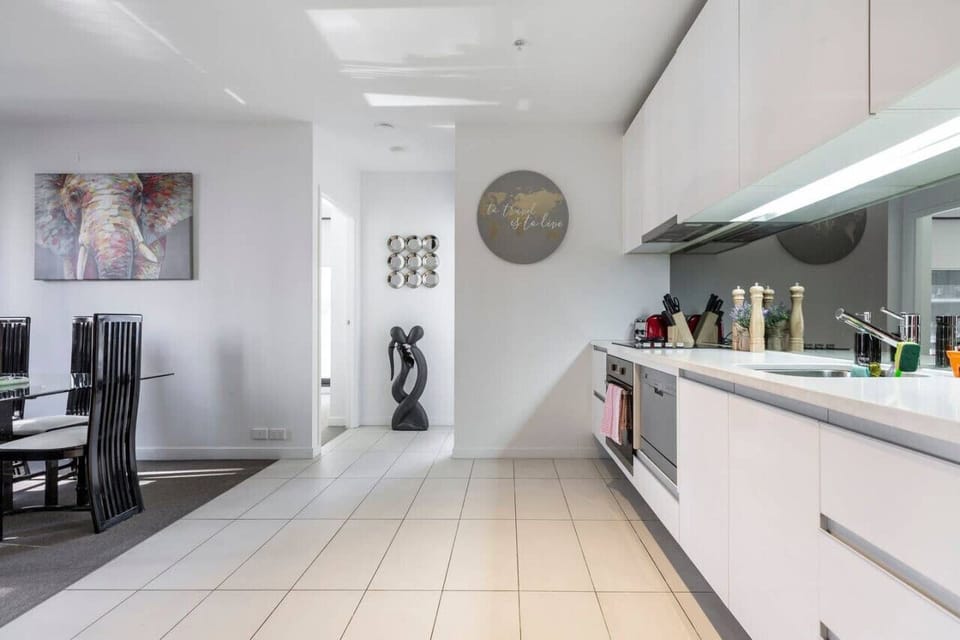 Spacious kitchen with modern art décor and everything you need to cook a meal
