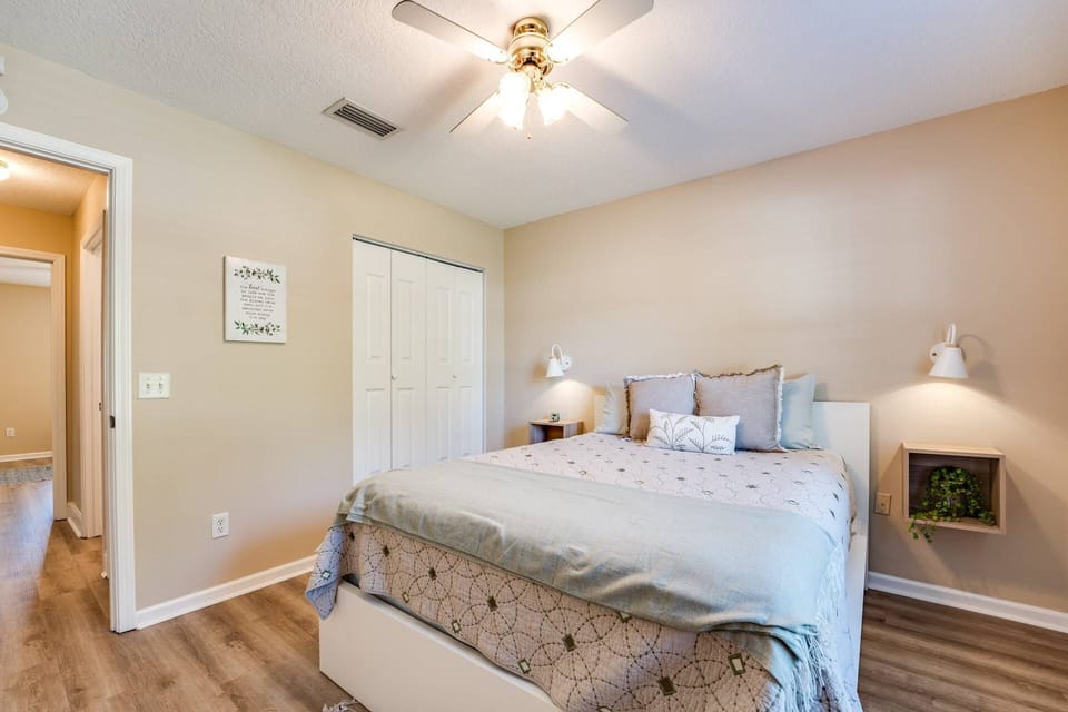 Queen Bed in the Guest Bedroom - closet - open shelf storage