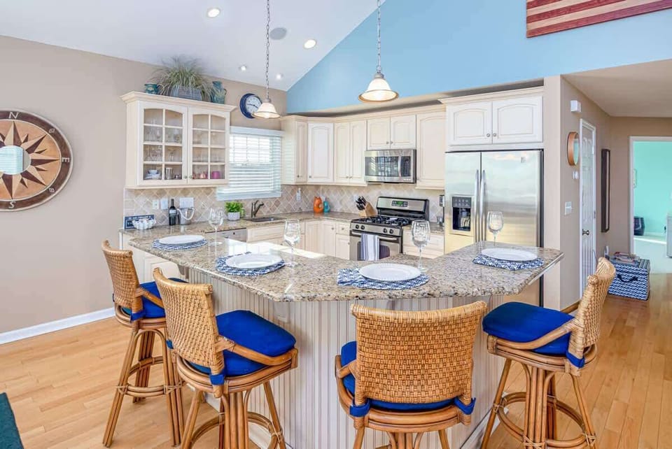 Fully equipped luxury kitchen with oversized island and seating