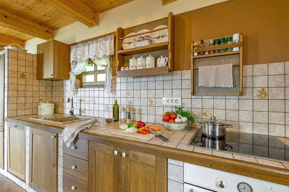 Family Chalet, Multiple Bedrooms, Mountainside (Rustic House With Lovely View) | Private kitchen | Fridge, oven, stovetop, dishwasher