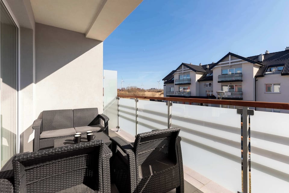 Balcony with garden furniture, where you can get some fresh air.
