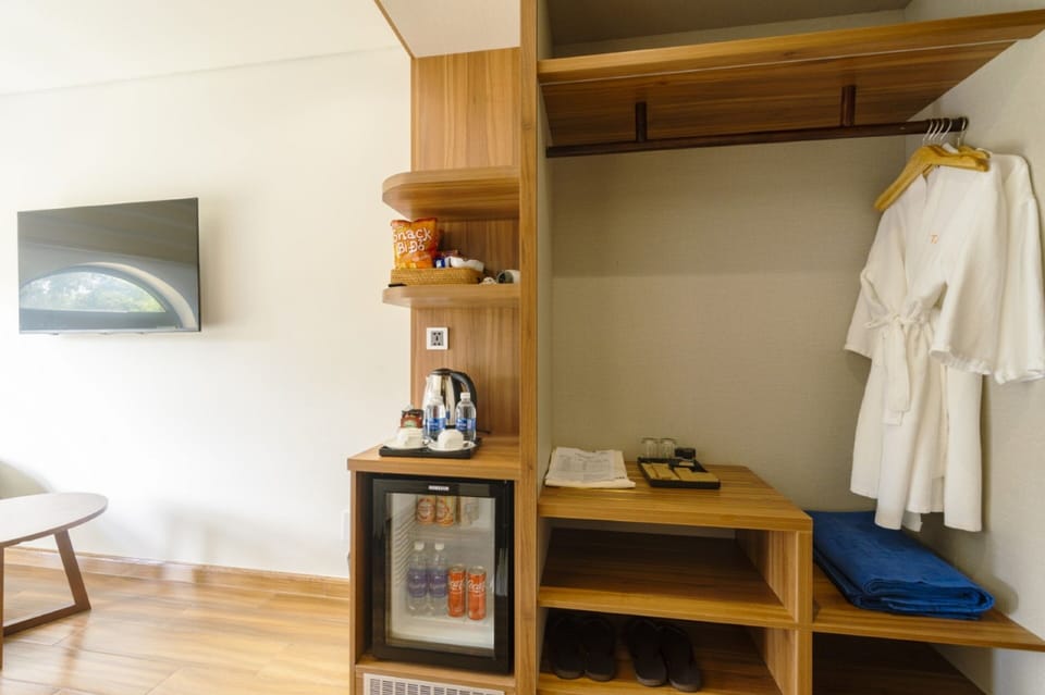 Deluxe Double Room, Garden View | Premium bedding, minibar, individually decorated, individually furnished