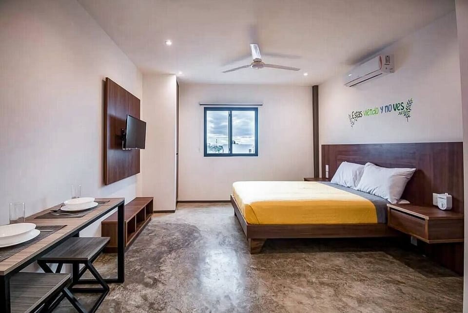 Comfortable bedroom with bed and table