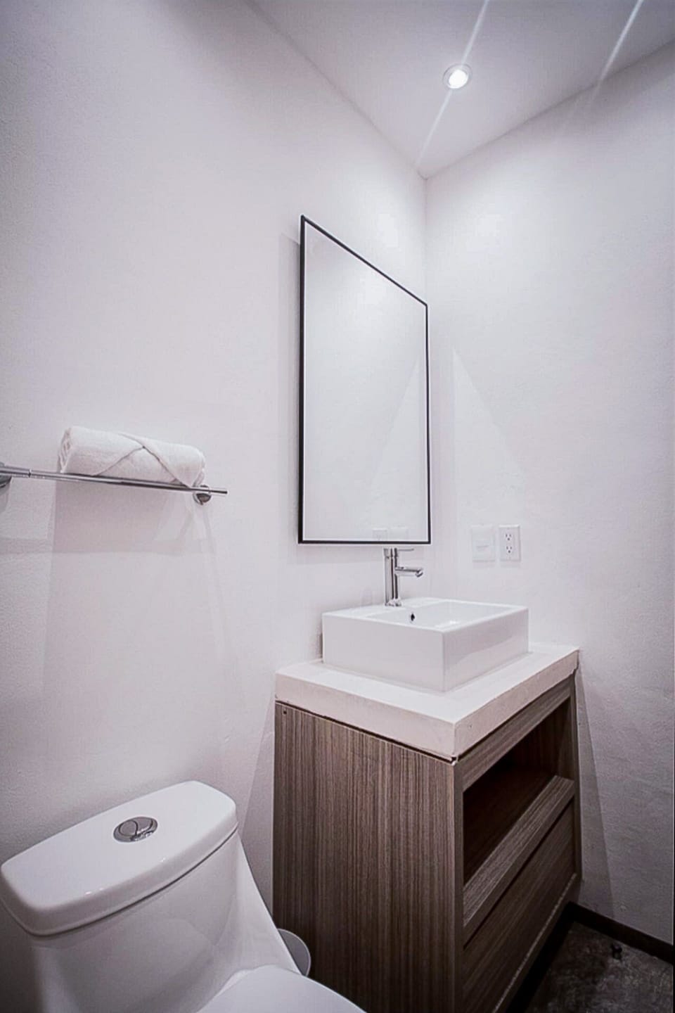 Bathroom with sink and toilet in Playa del Carmen accommodation.