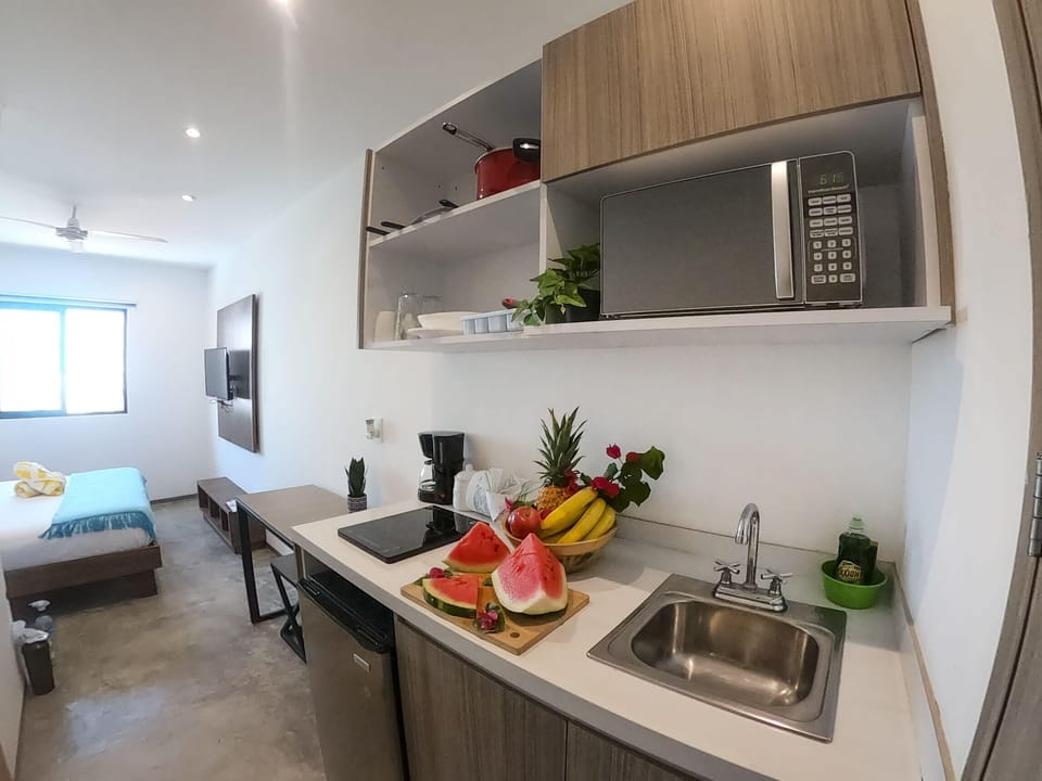 Kitchen with microwave and sink