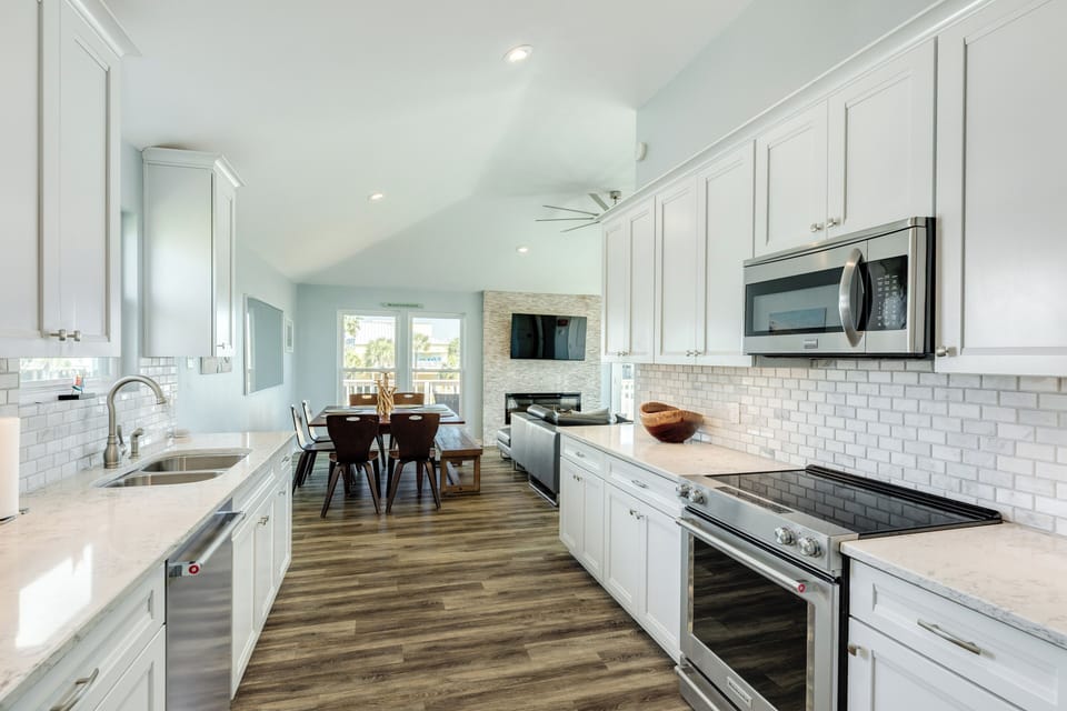 Easily serve homecooked meals from the adjacent kitchen