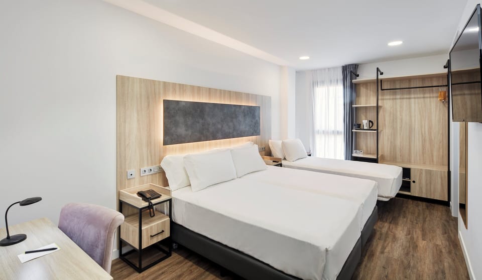 Classic Triple Room | Down comforters, minibar, in-room safe, free WiFi