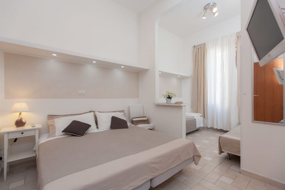 Family Quadruple Room, 1 Bedroom, Private Bathroom, City View | Down comforters, desk, blackout drapes, soundproofing
