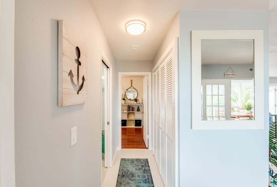 Hallway connecting 2 bedrooms 
Guest Bathroom and Laundry room 