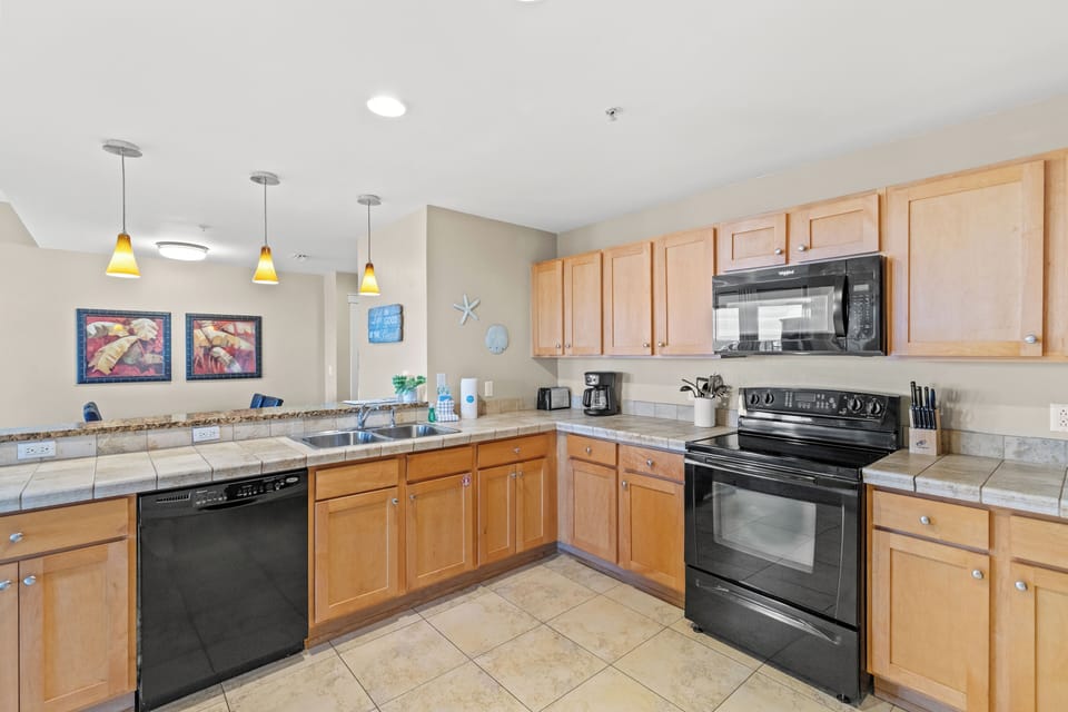Condo, Multiple Beds, Balcony, Partial Ocean View (Origins at Seahaven 1705) | Private kitchen | Coffee/tea maker