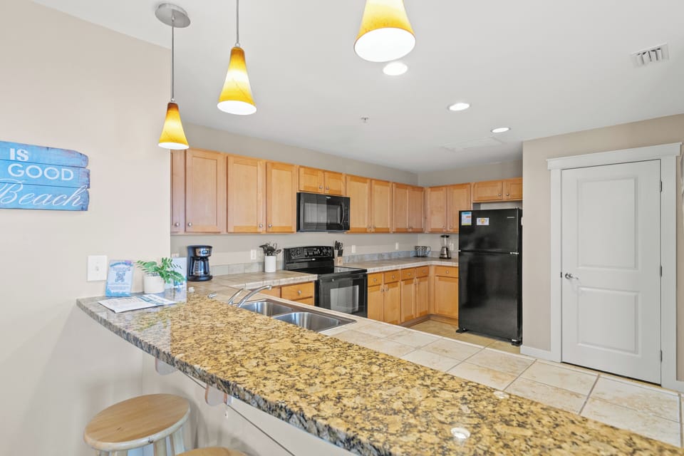 Condo, Multiple Beds, Balcony, Partial Ocean View (Origins at Seahaven 1705) | Private kitchen | Coffee/tea maker