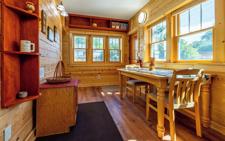 Sunroom leading to Bedroom 1 is a great spot for a morning cup of coffee