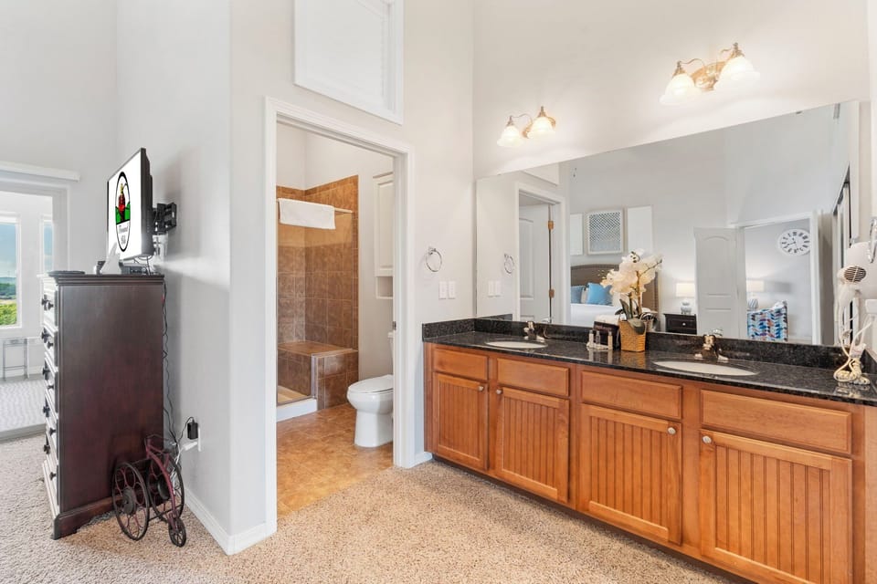 Master Bathroom with Double Vanity and Step-In Shower