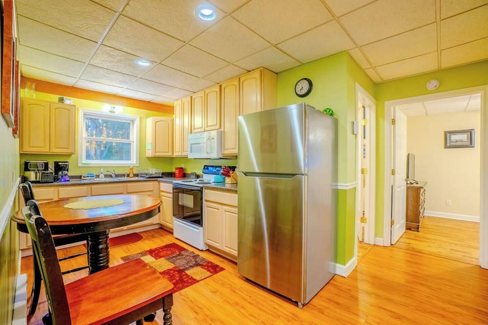 The small yet efficient kitchen also has seating for 2 people.