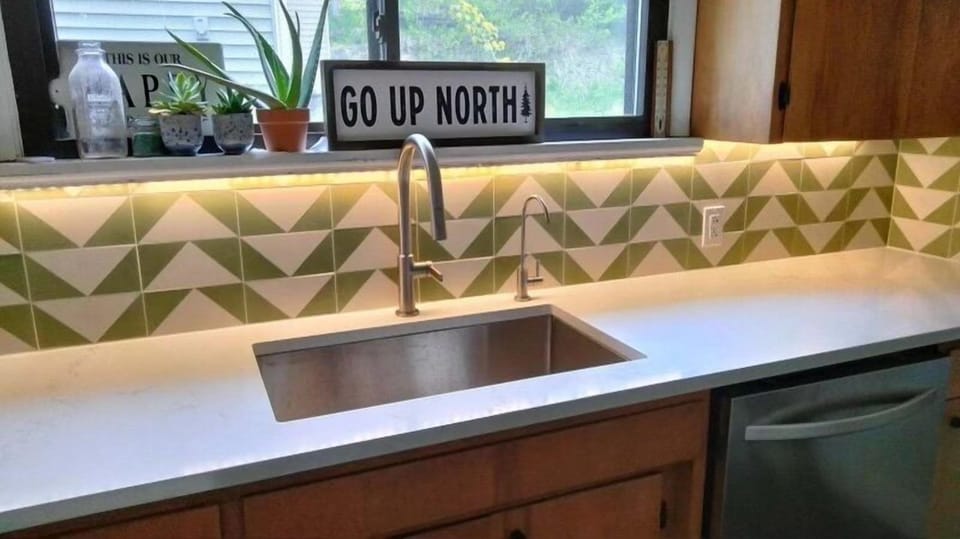 Kitchen - Newly remodeled countertops, sink and backsplash in the kitchen