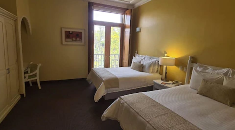 Superior Suite, 2 Queen Beds, City View | In-room safe, desk, blackout drapes, soundproofing
