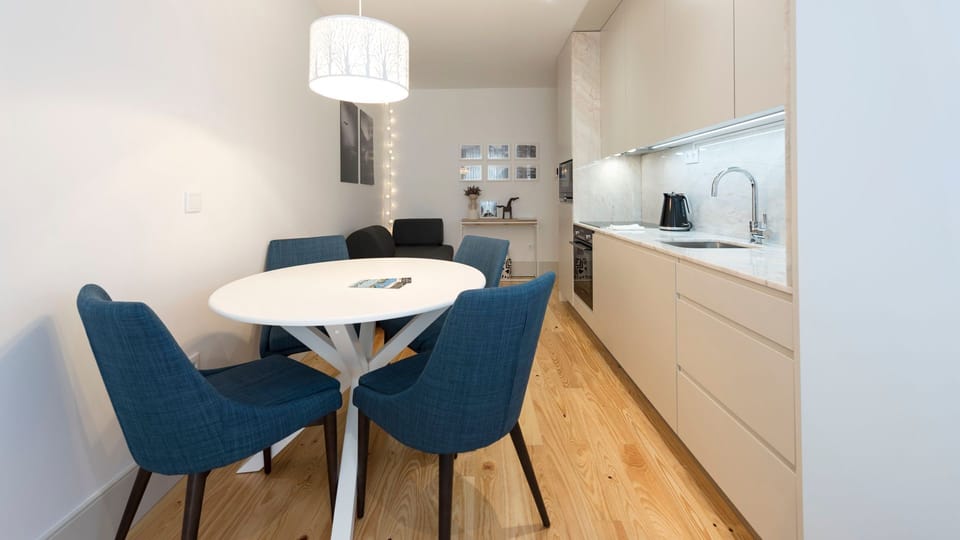 Gather around the stylish dining table for meals or planning your day, with the well-equipped kitchenette just steps away.
#DiningNook #Kitchenette #LovelyStay