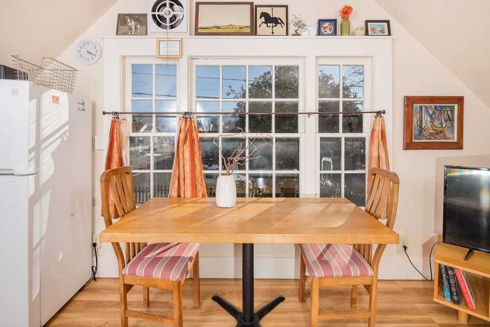Dining table overlooking front lawn and plenty of trees!