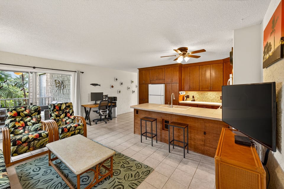 Open layout connects the living area to the kitchen, making it easy to unwind, cook, or spend time together in a relaxed, airy setting.