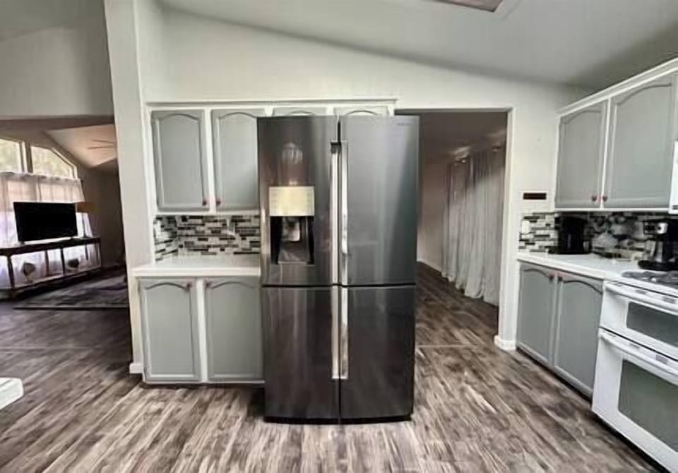 Full size refrigerator and stove.