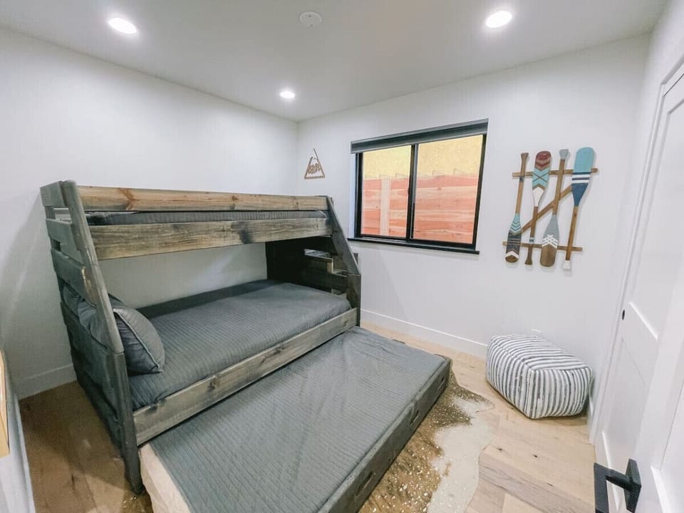 Downstairs bedroom with bunk beds and trundle