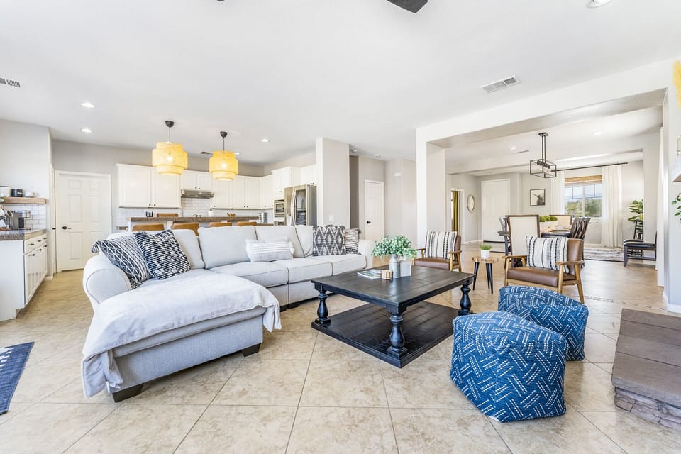 Breath deeply and relax in this stylish, open living room.