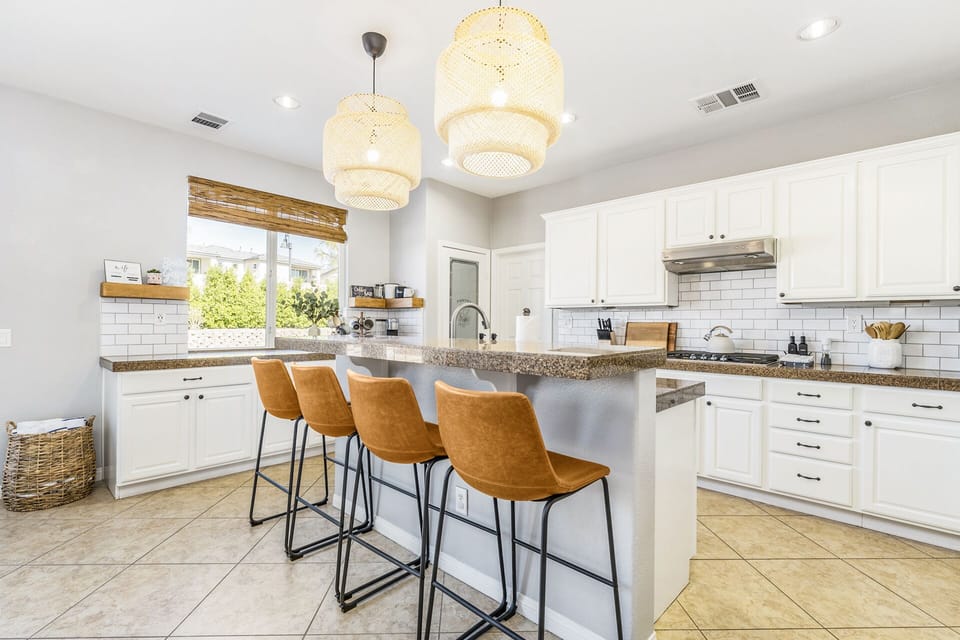 Enjoy your morning brew and tasty breakfast at this spacious kitchen island