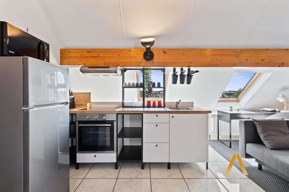 Compact Yet Stylish Kitchen – A well-organized kitchen with modern appliances and all the essentials you need for a convenient stay.
