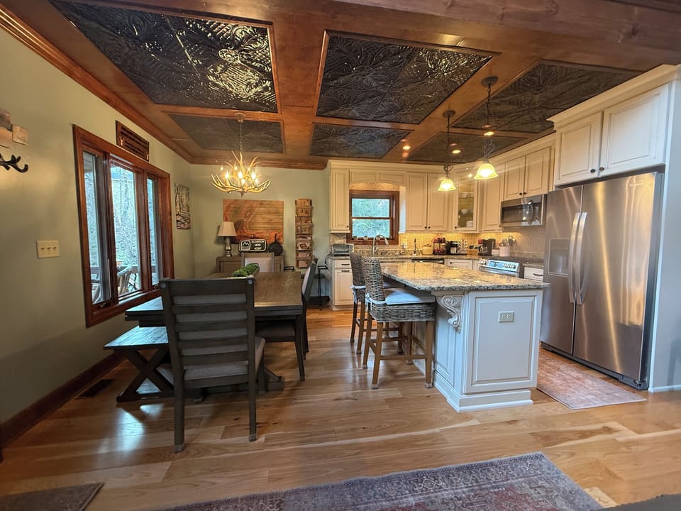 All new hickory wood floors, Kincaid furniture, and Frigidaire appliances