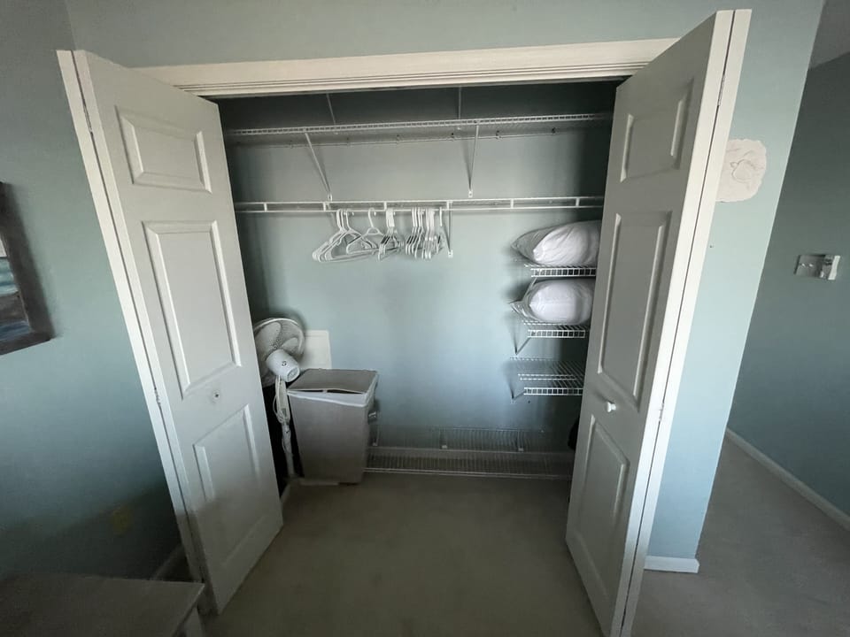 Large master bedroom closet with plenty of storage. 