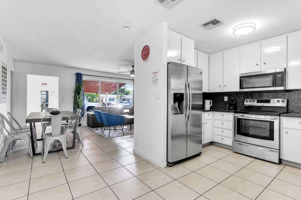 Cook with ease in our fully equipped kitchen featuring stainless steel appliances and granite counters. A clean, stylish space for all your vacation meals!