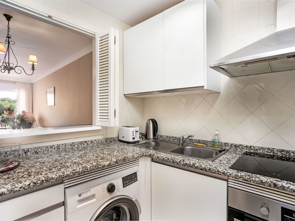 Countertop, Kitchen, Interior Design, Flooring, Major Appliance, Floor, Kitchen Appliance, Ceiling, Home, Cabinetry