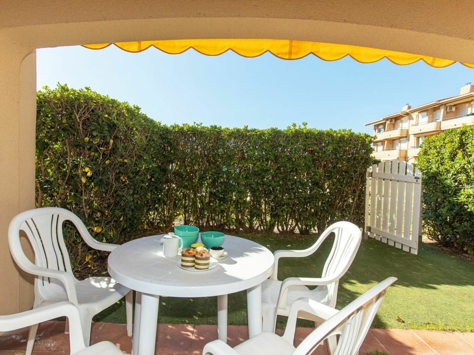 Furniture, Property, Plant, Chair, Table, Building, Nature, Azure, Outdoor Furniture, Outdoor Table